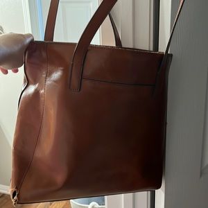 Patricia Nash bag. Minor chew on the bottom
